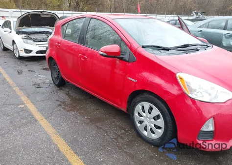 2014 Toyota Prius C One from USA, damaged, VIN JTDKDTB37E1068836
